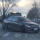 Illustration for article titled Tow Truck Driver Has No Fucks Left Leaving Tesla Parking Lot